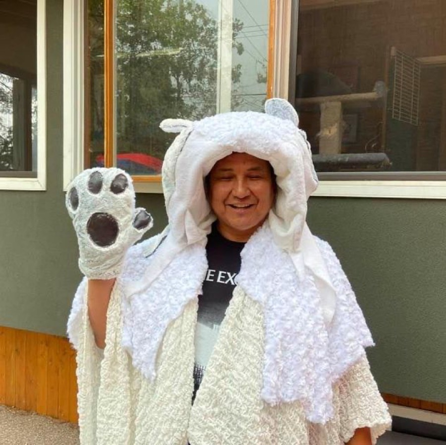 Walter smiling in a white bear costume
