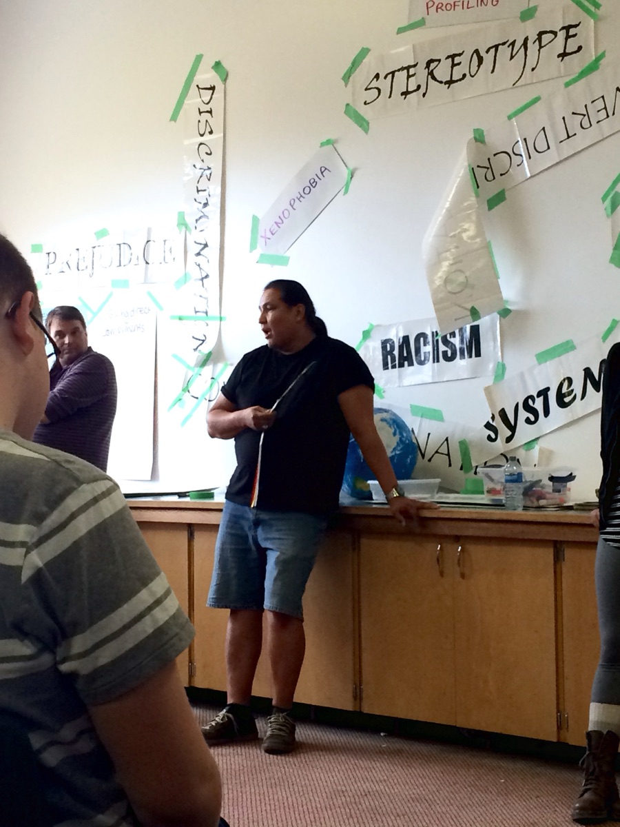 Walter leading a discussion on stereotypes and racism